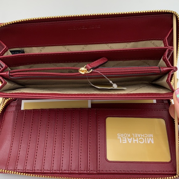 MICHAEL KORS
Leather Continental Wristlet Phone Case Wallet 
Oxblood 
NWT - Picture 4 of 16